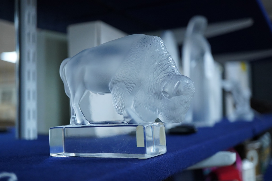 A Lalique crystal frosted glass Bison on polished clear glass paperweight paperweight (boxed), 12cm wide x 10cm high